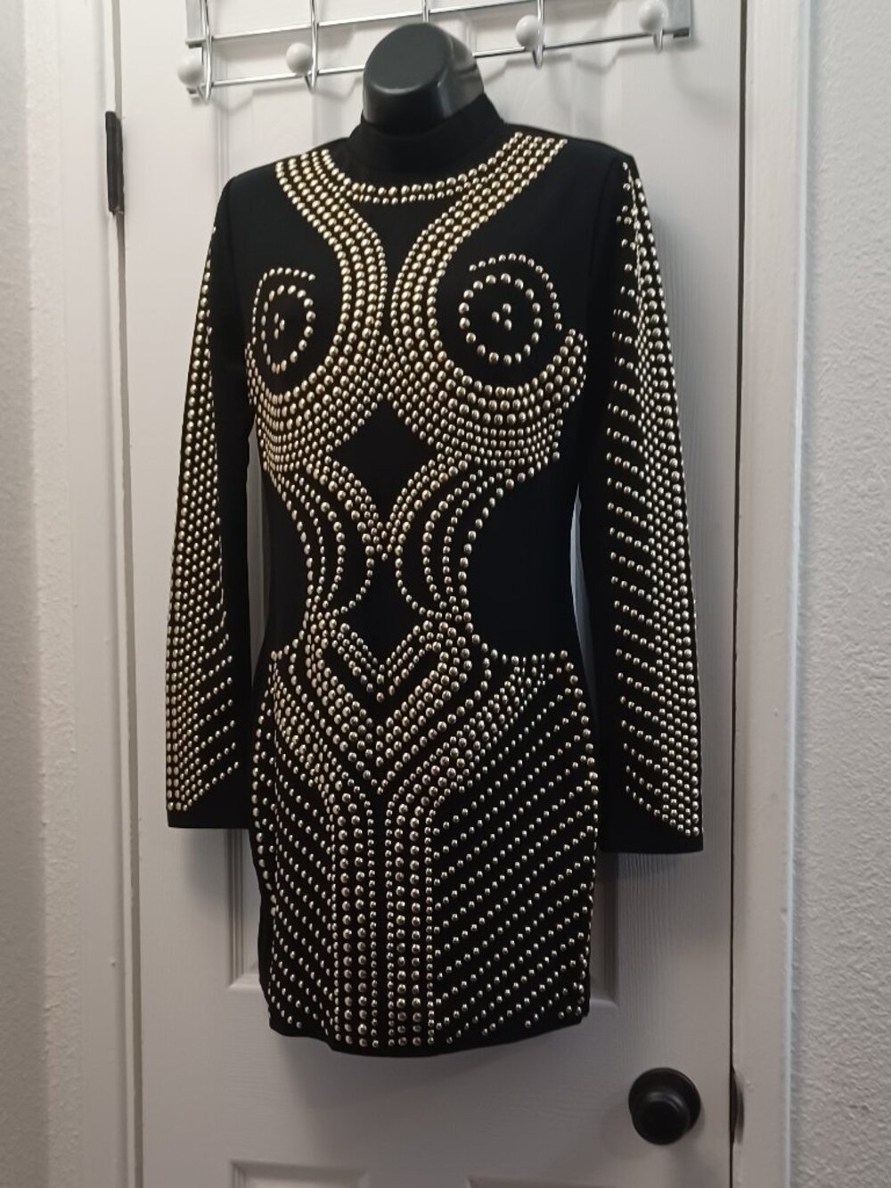Black dress with silver studs in a wave-like pattern #studded #wave